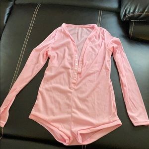 Pink body suit